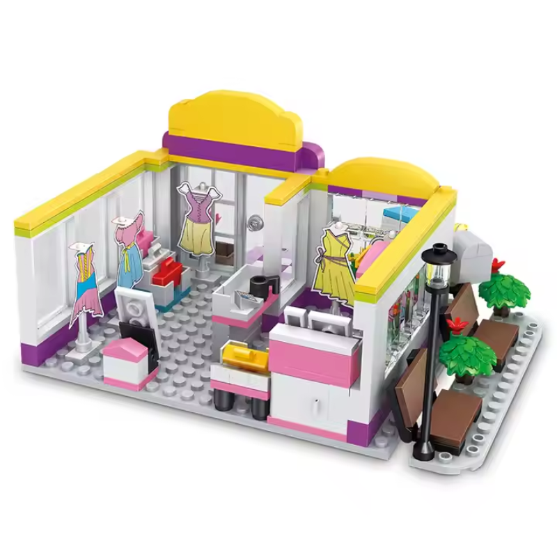 Bricks Box Friends Clothes Shop set with LEGO-style boutique building, mini figures, clothing displays, and accessories.