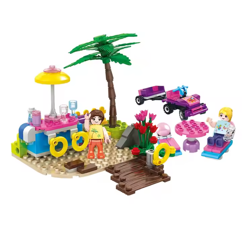 LEGO-style Bricks Box Friends beach scene with mini figures, umbrellas, surfboards, and beach accessories.
